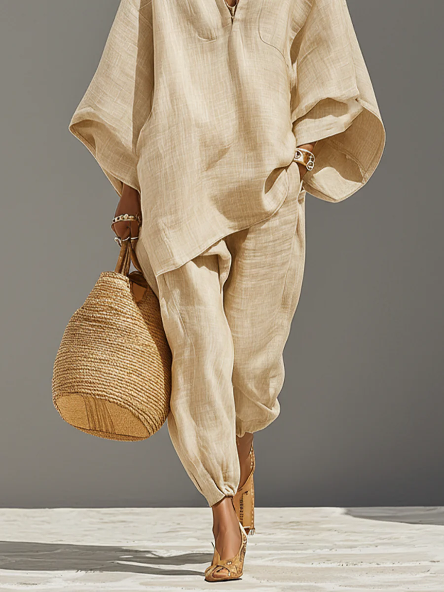 Conjunto minimalista en khaki claro con top de dobladillo asimétrico y pantalones jogger